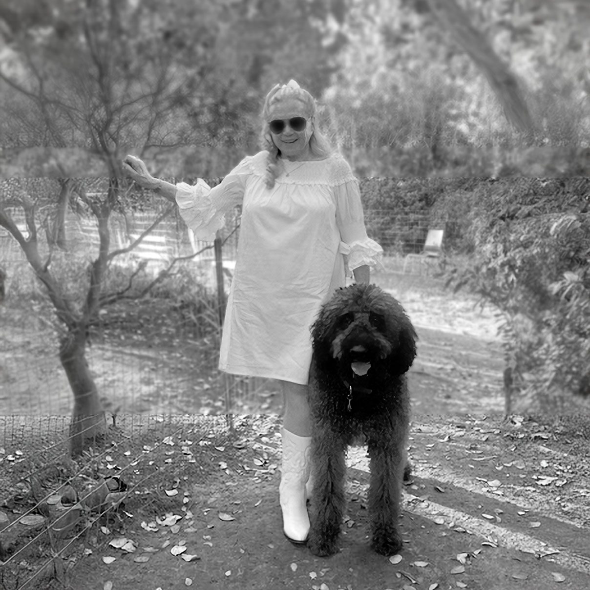 Ronnie Haran today, outdoors with her dog
